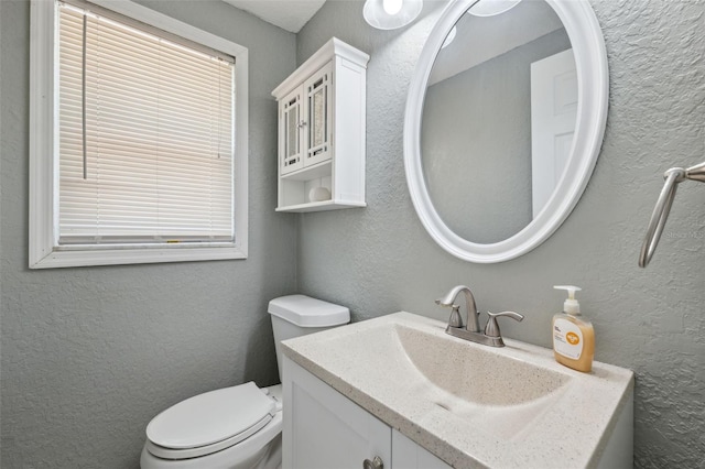 8897 54th St N, Pinellas Park, FL 33782 - half bathroom with vanity and a textured wall