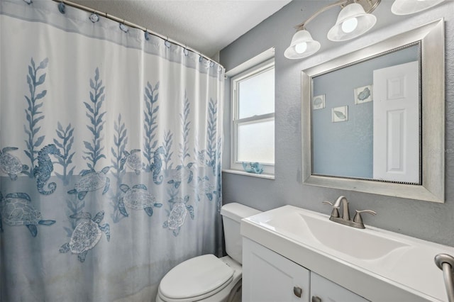 8897 54th St N, Pinellas Park, FL 33782 - bathroom featuring vanity, a textured wall, curtained shower, and a textured ceiling