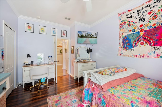 5102 Pheasant Woods Dr, Lutz, FL 33558 - bedroom with dark wood-type flooring, ornamental molding, a desk, and a ceiling fan