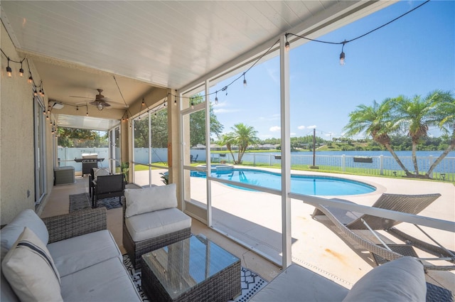 5102 Pheasant Woods Dr, Lutz, FL 33558 - sunroom / solarium featuring an outdoor living space, ceiling fan, and a water view