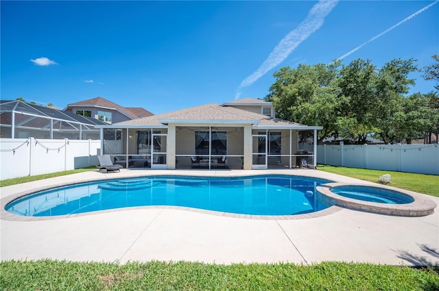 5102 Pheasant Woods Dr, Lutz, FL 33558 - view of pool featuring a sunroom, a fenced backyard, and a patio