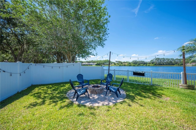 5102 Pheasant Woods Dr, Lutz, FL 33558 - fenced backyard featuring a fire pit and a water view