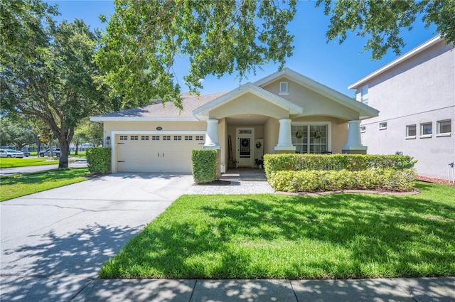 5102 Pheasant Woods Dr, Lutz, FL 33558 - view of front of house with an attached garage, stucco siding, a front lawn, and driveway