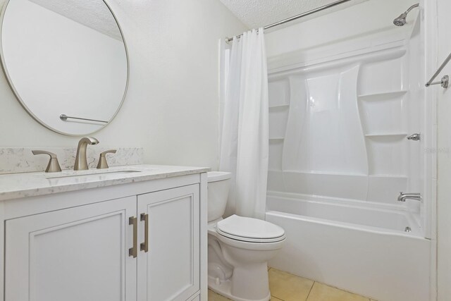 302 Lake Parsons Grn Unit 104, Brandon, FL 33511 - full bathroom featuring vanity, shower / bathtub combination with curtain, tile patterned flooring, and a textured ceiling