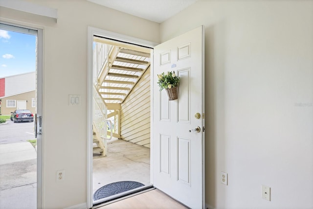 302 Lake Parsons Grn Unit 104, Brandon, FL 33511 - foyer featuring healthy amount of natural light