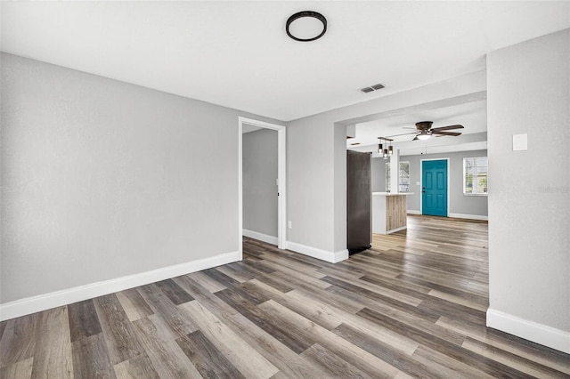 3330 Rock Royal Dr, Holiday, FL 34691 - spare room featuring wood finished floors and ceiling fan