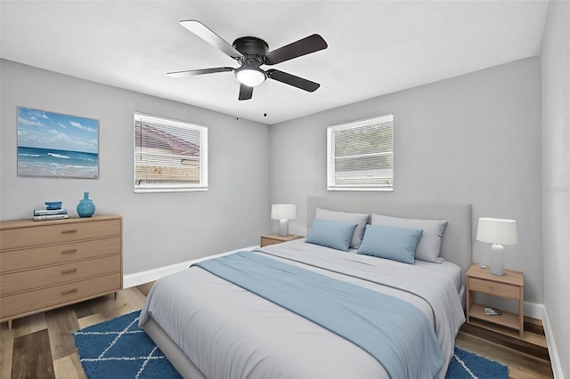 3330 Rock Royal Dr, Holiday, FL 34691 - bedroom featuring wood finished floors and ceiling fan