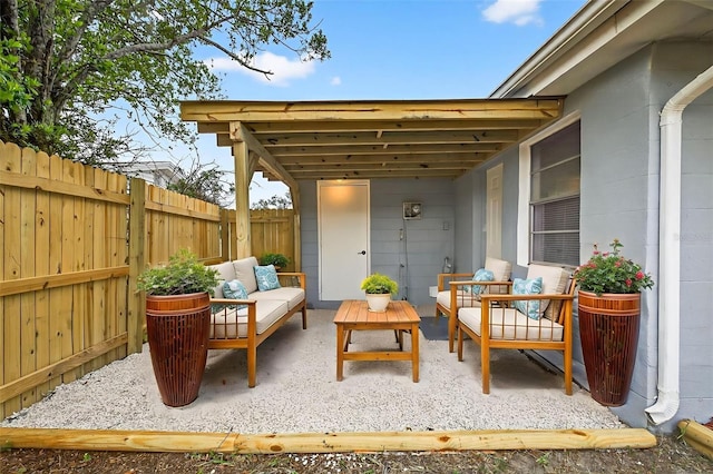 3330 Rock Royal Dr, Holiday, FL 34691 - fenced backyard with an outdoor hangout area and a patio area