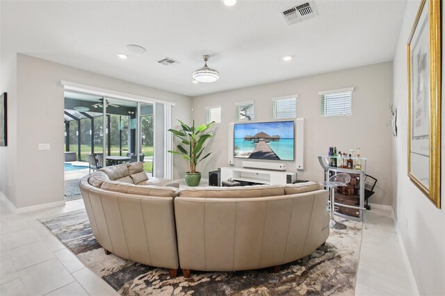 9107 Rally Spring Loop, Wesley Chapel, FL 33545 - living room featuring ceiling fan and recessed lighting