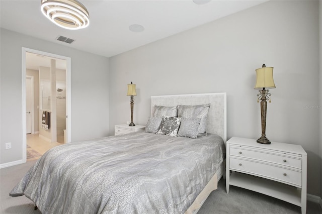 9107 Rally Spring Loop, Wesley Chapel, FL 33545 - bedroom with carpet and ensuite bath