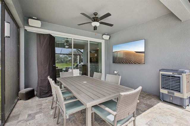 9107 Rally Spring Loop, Wesley Chapel, FL 33545 - view of patio featuring ceiling fan, heating unit, and outdoor dining area