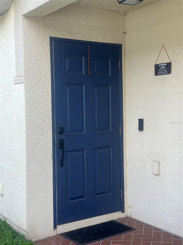 7719 Carriage Pointe Dr, Gibsonton, FL 33534 - property entrance with stucco siding