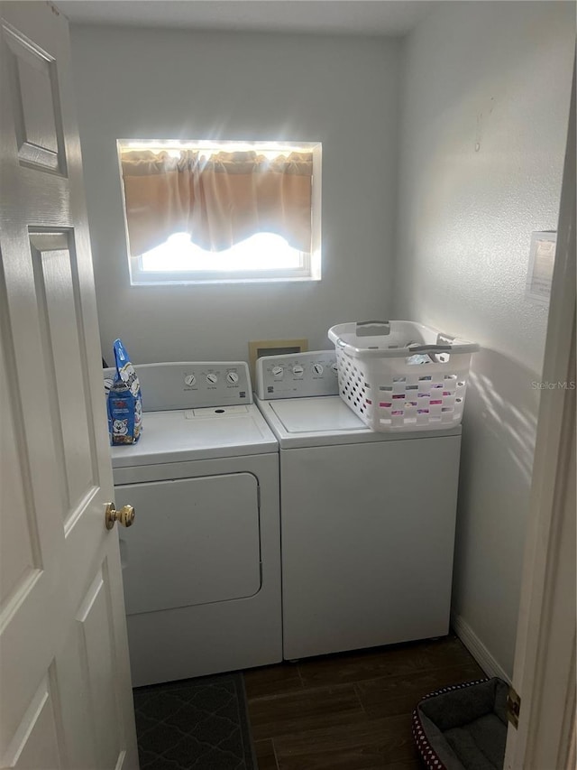 7719 Carriage Pointe Dr, Gibsonton, FL 33534 - laundry area featuring washer and dryer and dark wood-style flooring