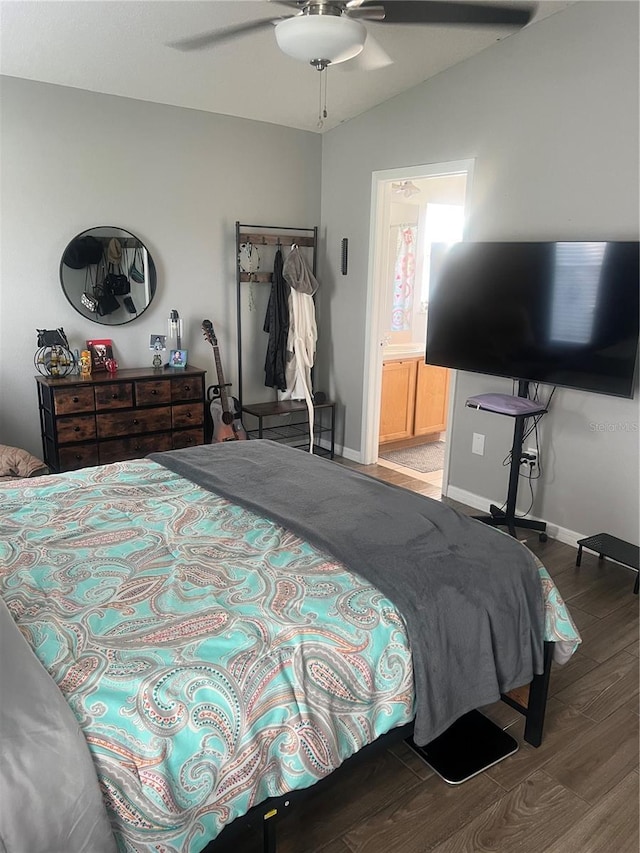 7719 Carriage Pointe Dr, Gibsonton, FL 33534 - bedroom featuring wood finished floors, connected bathroom, ceiling fan, and lofted ceiling
