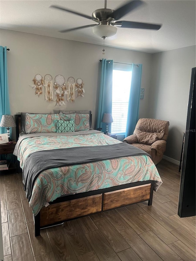 7719 Carriage Pointe Dr, Gibsonton, FL 33534 - bedroom with wood finished floors and ceiling fan