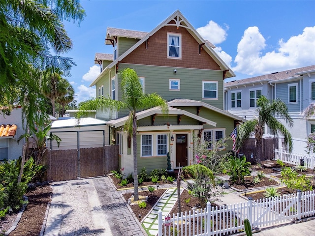 2504 W N A St Unit A, Tampa, FL 33609 - craftsman inspired home featuring a fenced front yard and a gate