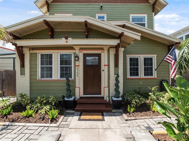 2504 W N A St Unit A, Tampa, FL 33609 - doorway to property featuring brick siding