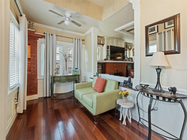 2504 W N A St Unit A, Tampa, FL 33609 - sitting room with a fireplace, plenty of natural light, a ceiling fan, hardwood / wood-style flooring, and ornamental molding