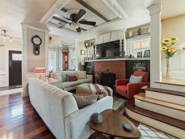 2504 W N A St Unit A, Tampa, FL 33609 - living area with ornamental molding, a ceiling fan, wainscoting, healthy amount of natural light, and dark wood-type flooring