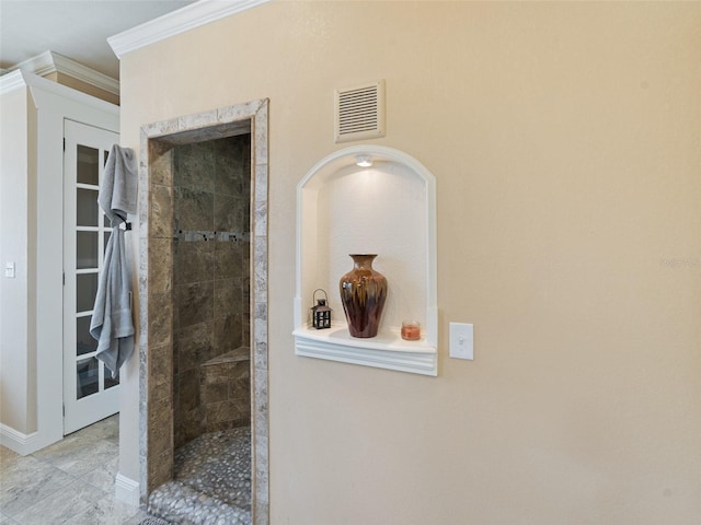 2504 W N A St Unit A, Tampa, FL 33609 - bathroom featuring crown molding and tiled shower