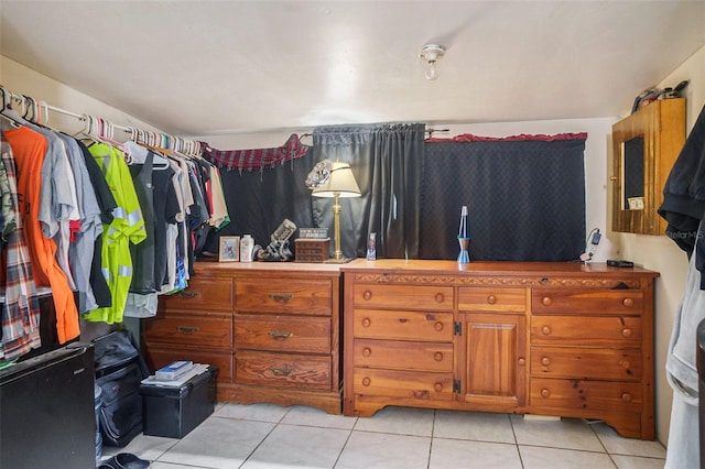 5651 6th St, Zephyrhills, FL 33542 - walk in closet with light tile patterned flooring