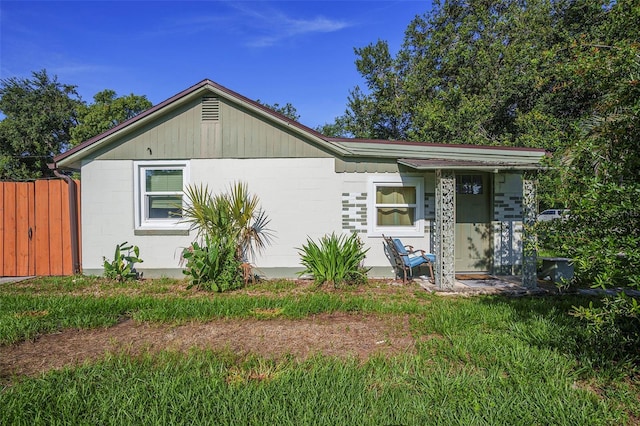 5651 6th St, Zephyrhills, FL 33542 - view of front of home with concrete block siding
