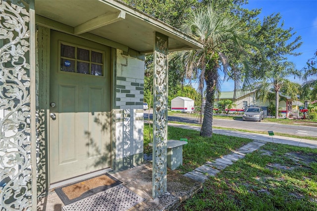 5651 6th St, Zephyrhills, FL 33542 - entrance to property featuring a porch