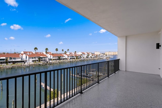 400 150th Ave Unit 205, Madeira Beach, FL 33708 - balcony featuring a water view and a residential view