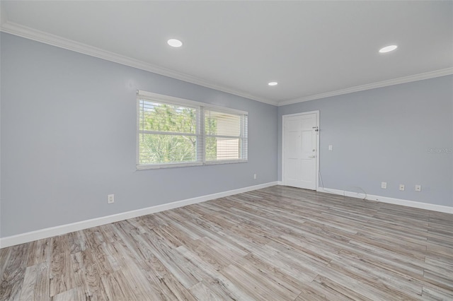 2525 W Bay Dr Unit A46, Largo, FL 33770 - unfurnished room featuring crown molding, light wood-style floors, and recessed lighting