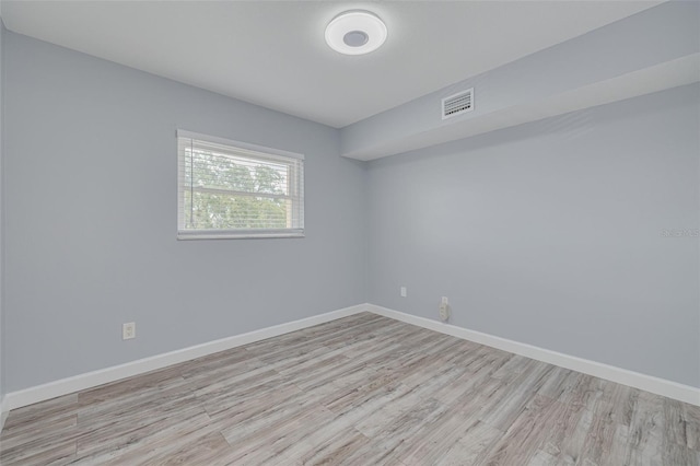 2525 W Bay Dr Unit A46, Largo, FL 33770 - unfurnished room with wood finished floors and baseboards