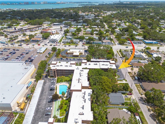 2525 W Bay Dr Unit A46, Largo, FL 33770 - drone / aerial view of a pool and a large body of water