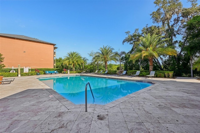 6017 Westgate Dr Unit 924, Orlando, FL 32835 - community pool featuring a patio area