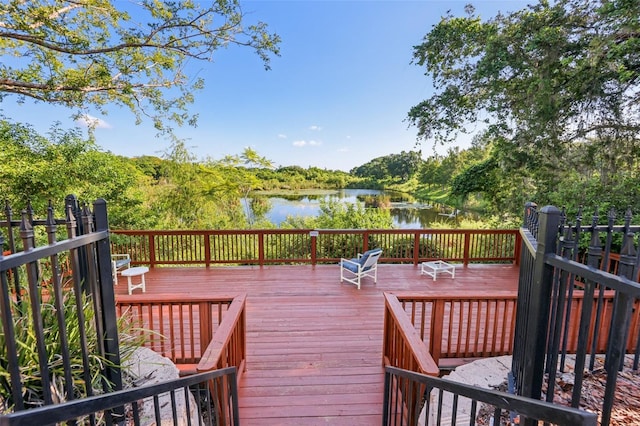 6017 Westgate Dr Unit 924, Orlando, FL 32835 - wooden deck with a water view