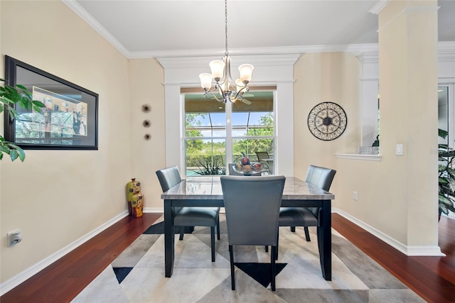 11729 Newberry Grove Loop, Riverview, FL 33579 - dining area with a chandelier, wood finished floors, and crown molding