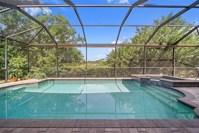 11729 Newberry Grove Loop, Riverview, FL 33579 - view of swimming pool featuring a pool with connected hot tub and a lanai