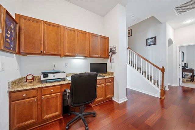 11729 Newberry Grove Loop, Riverview, FL 33579 - office space with built in study area, dark wood finished floors, and arched walkways