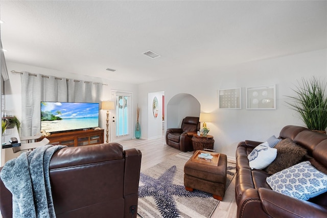1711 N Highland Ave, Clearwater, FL 33755 - living room featuring wood finished floors and baseboards