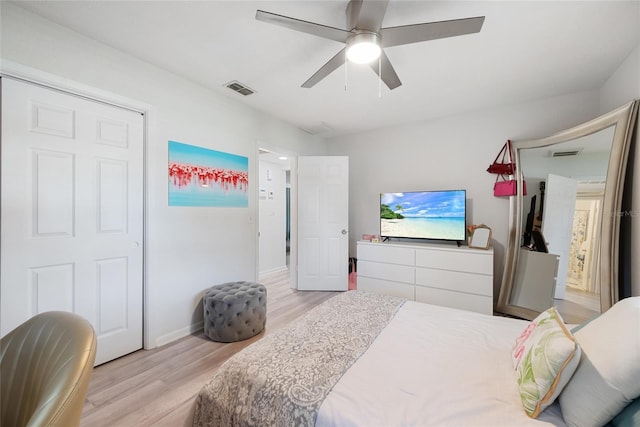 1711 N Highland Ave, Clearwater, FL 33755 - bedroom with light wood-style flooring and ceiling fan