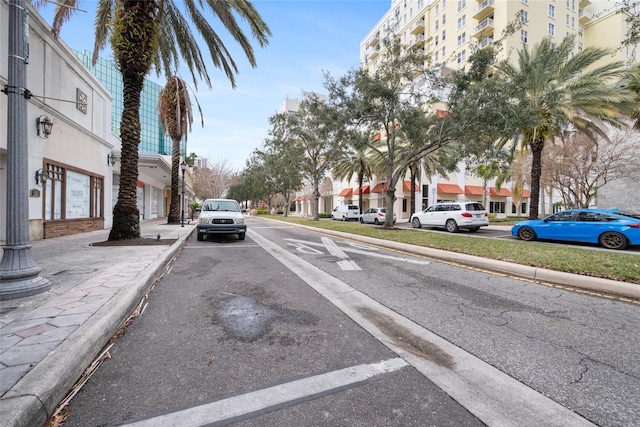 1711 N Highland Ave, Clearwater, FL 33755 - view of asphalt road featuring curbs and sidewalks