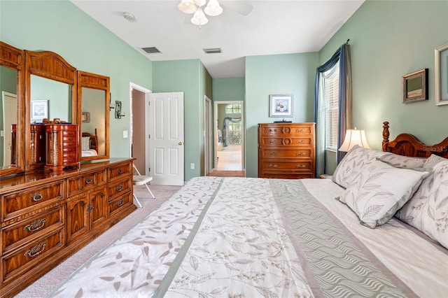 3246 Brenford Pl, Land O Lakes, FL 34638 - bedroom featuring light carpet, ensuite bathroom, and ceiling fan