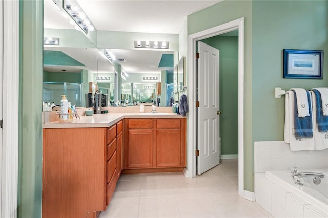 3246 Brenford Pl, Land O Lakes, FL 34638 - bathroom featuring vanity, tile patterned floors, a shower stall, and a bath