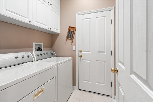 3246 Brenford Pl, Land O Lakes, FL 34638 - laundry area with cabinet space, washing machine and dryer, and light tile patterned floors