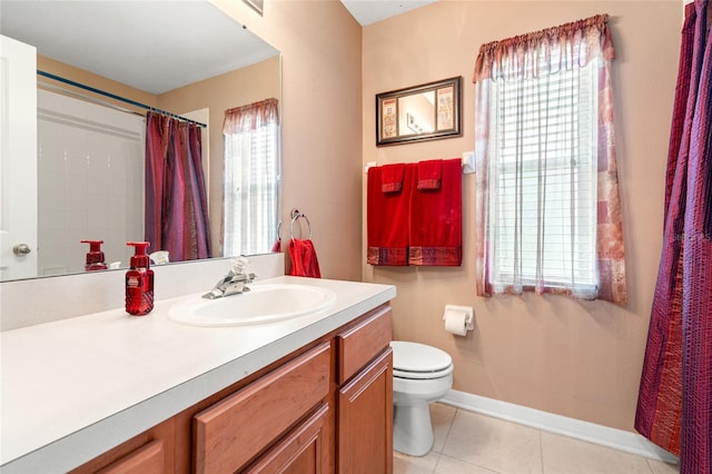 3246 Brenford Pl, Land O Lakes, FL 34638 - bathroom with vanity, tile patterned flooring, and curtained shower