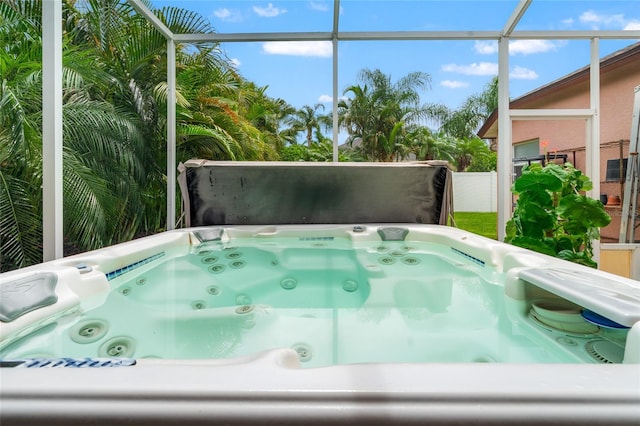3246 Brenford Pl, Land O Lakes, FL 34638 - view of pool featuring a hot tub and a lanai