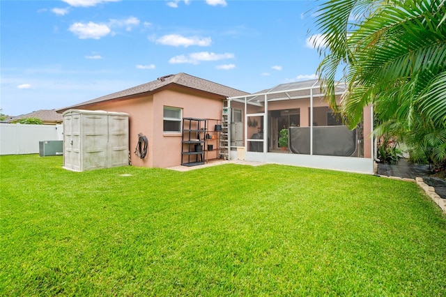 3246 Brenford Pl, Land O Lakes, FL 34638 - back of property featuring stucco siding and a storage unit