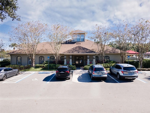 3246 Brenford Pl, Land O Lakes, FL 34638 - view of front of home featuring uncovered parking and stucco siding