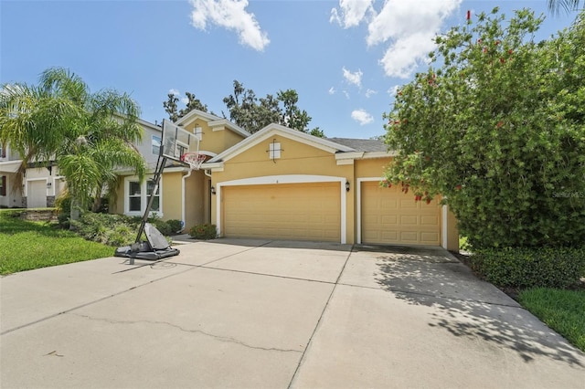 6706 Riverside Bluffs Dr, Riverview, FL 33578 - view of front of property featuring stucco siding, concrete driveway, and an attached garage