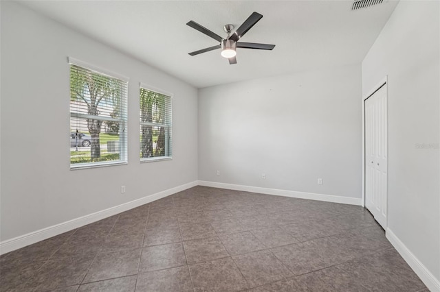 6706 Riverside Bluffs Dr, Riverview, FL 33578 - unfurnished room featuring a ceiling fan and tile patterned floors