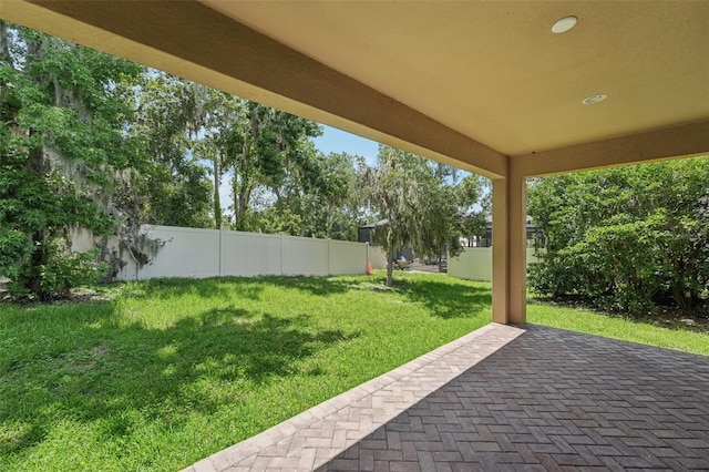 6706 Riverside Bluffs Dr, Riverview, FL 33578 - view of yard with a patio area
