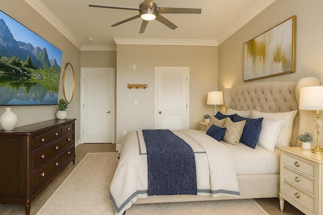 2741 Via Cipriani Unit 916A, Clearwater, FL 33764 - bedroom with ornamental molding, wood finished floors, and a ceiling fan